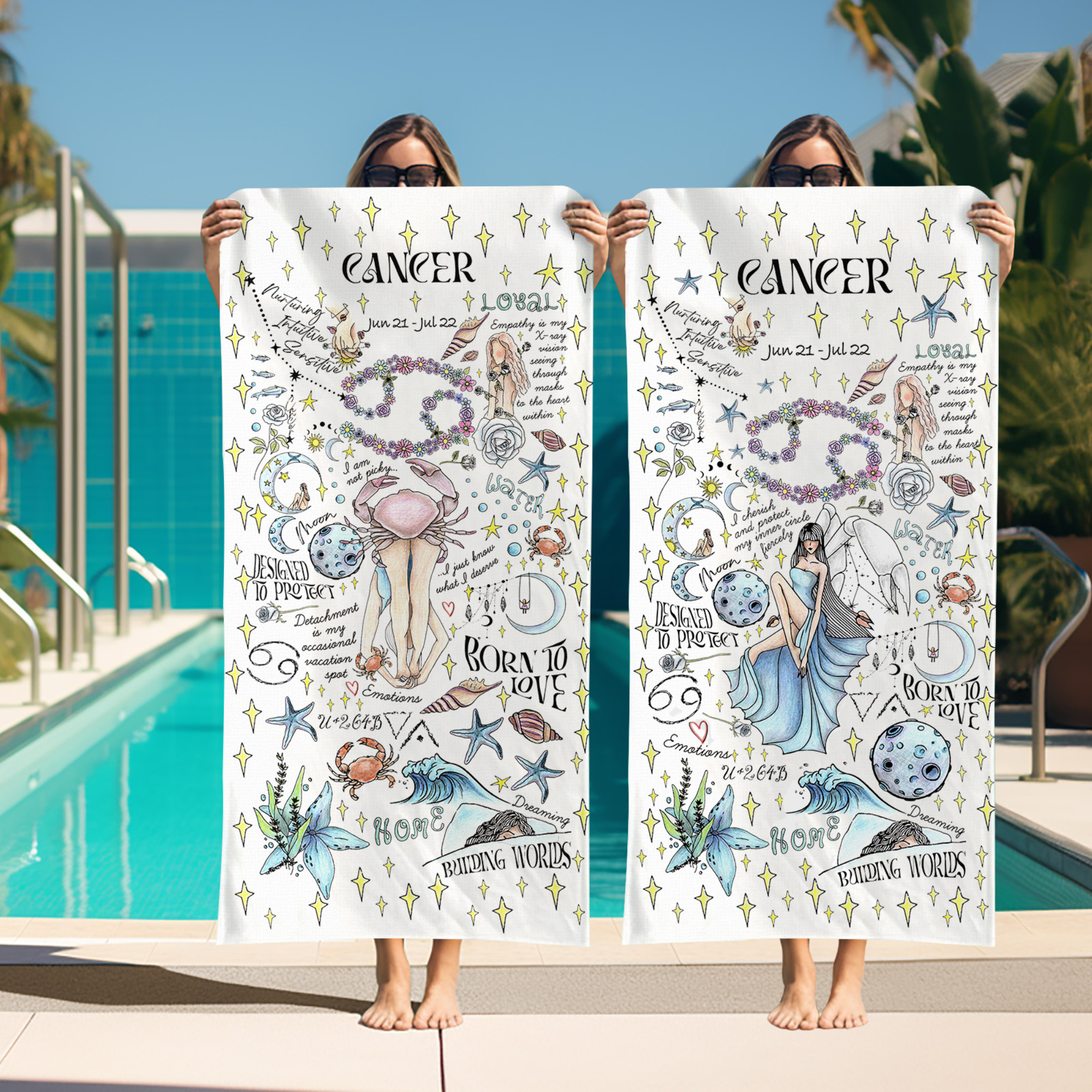 two women are holding up a towel near a swimming pool