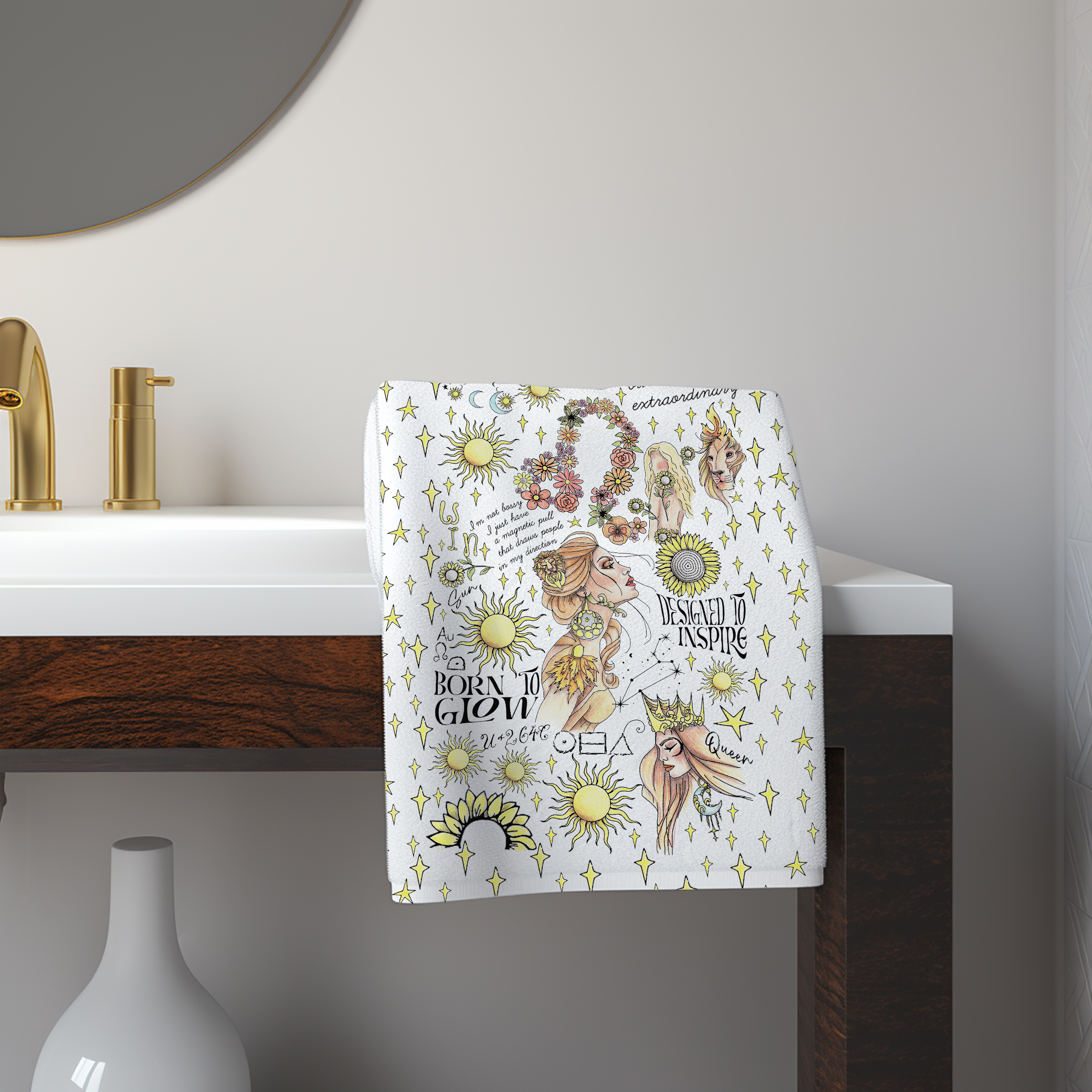 a towel hanging from a bathroom sink next to a vase