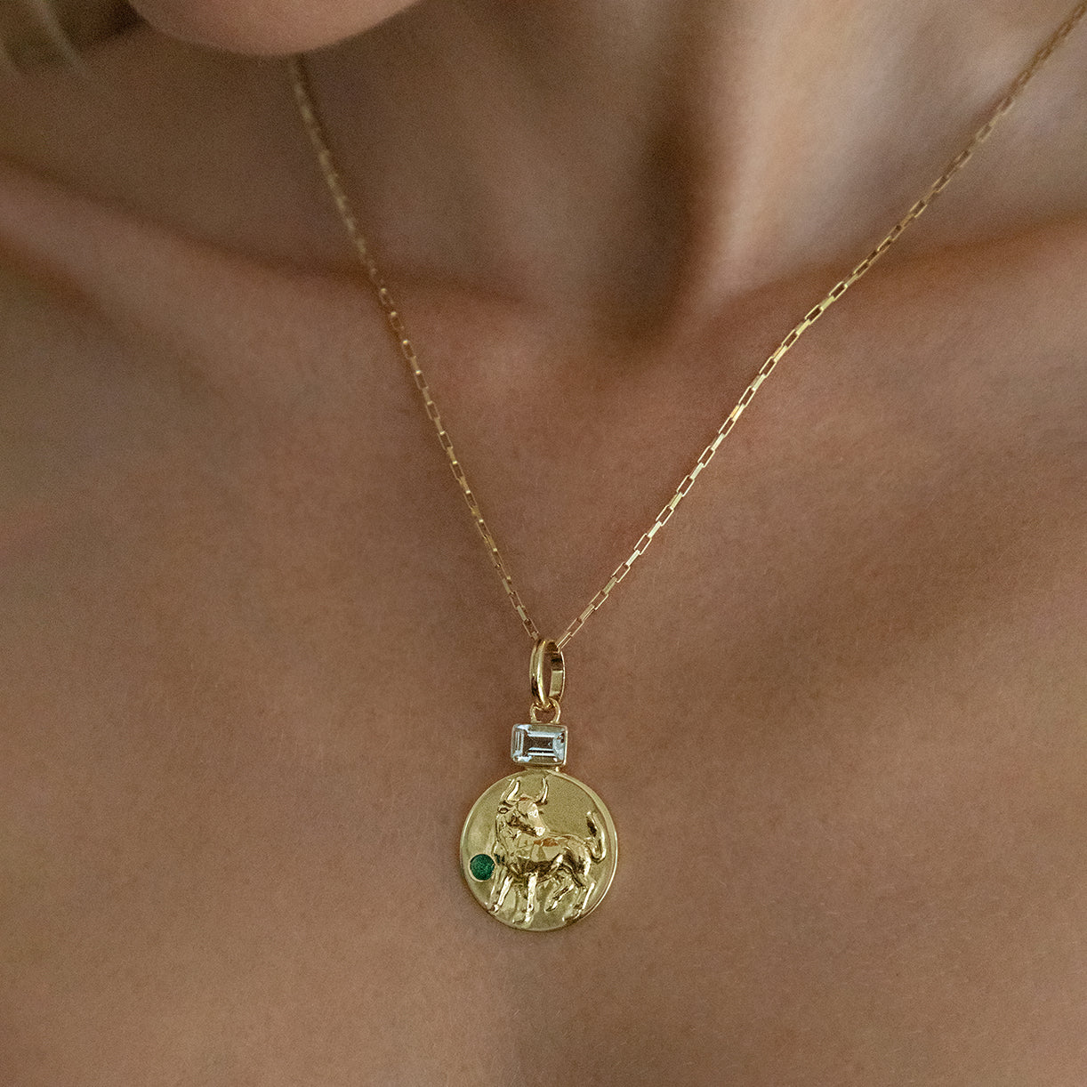 Taurus coin pendant with aquamarine and emerald birthstones // Gold